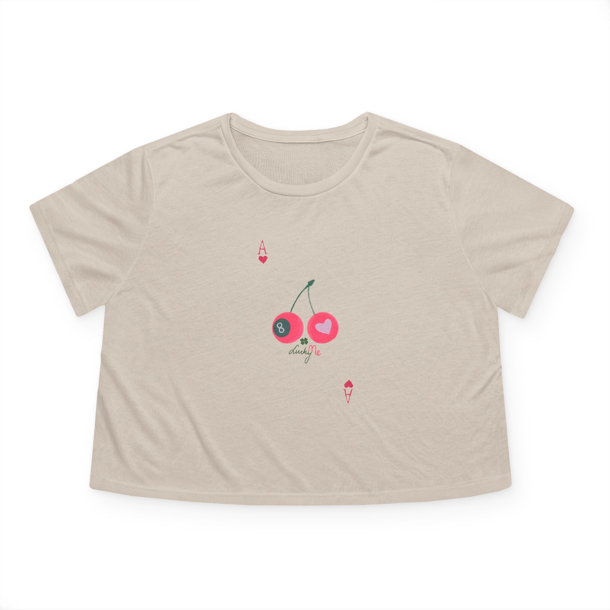 Cropped t-shirt in Heather Dust color featuring Lucky Me print with cherries, 8-ball, and heart. Color selection shown on the side.