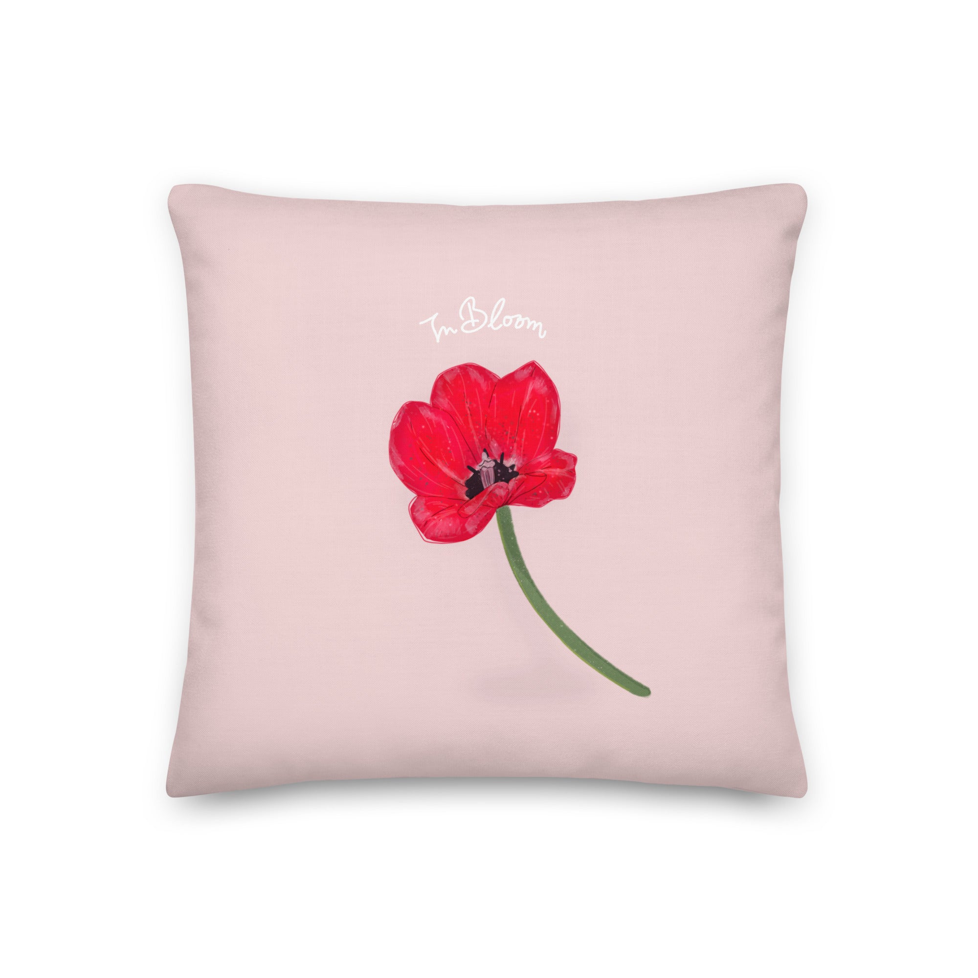 Hand-illustrated red poppy flower on a blush pink linen-look throw pillow with "In Bloom" script – square format