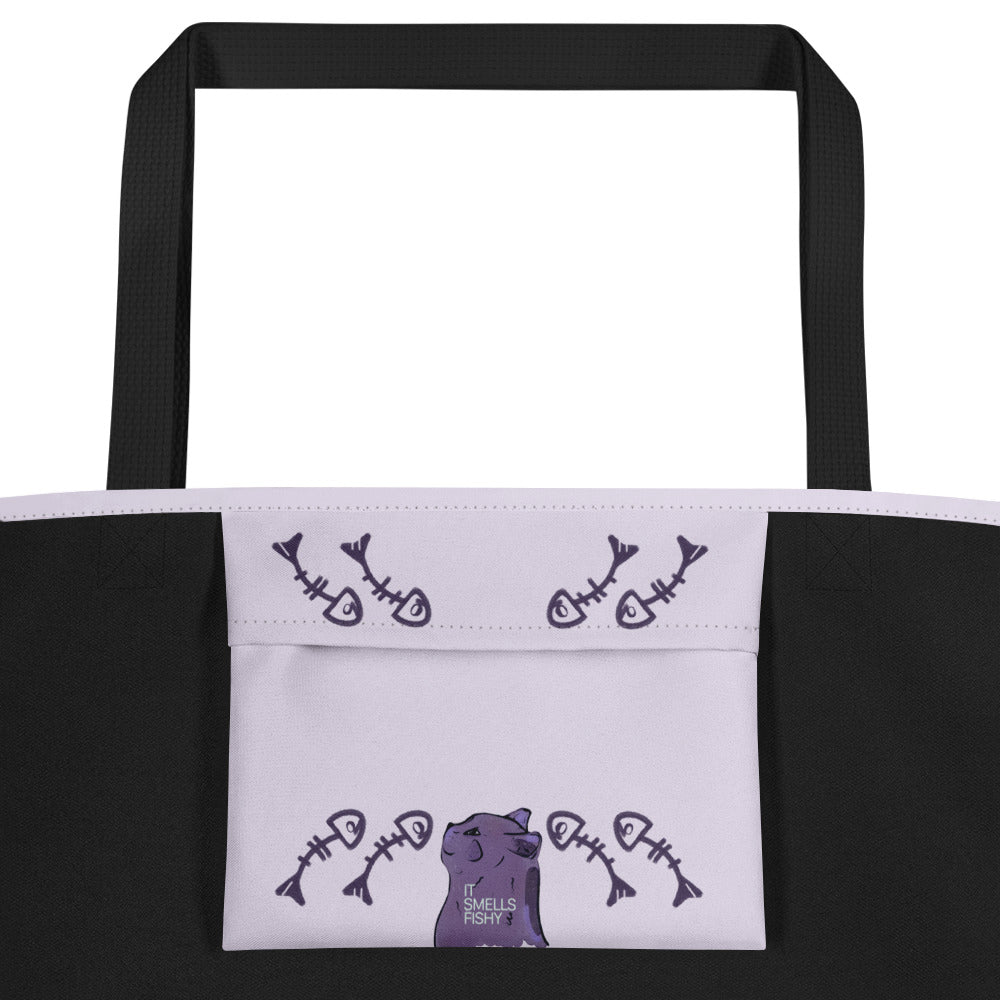 Purple illustrated cat tote bag with the phrase “It smells fishy” – playful, sassy design on light lilac background