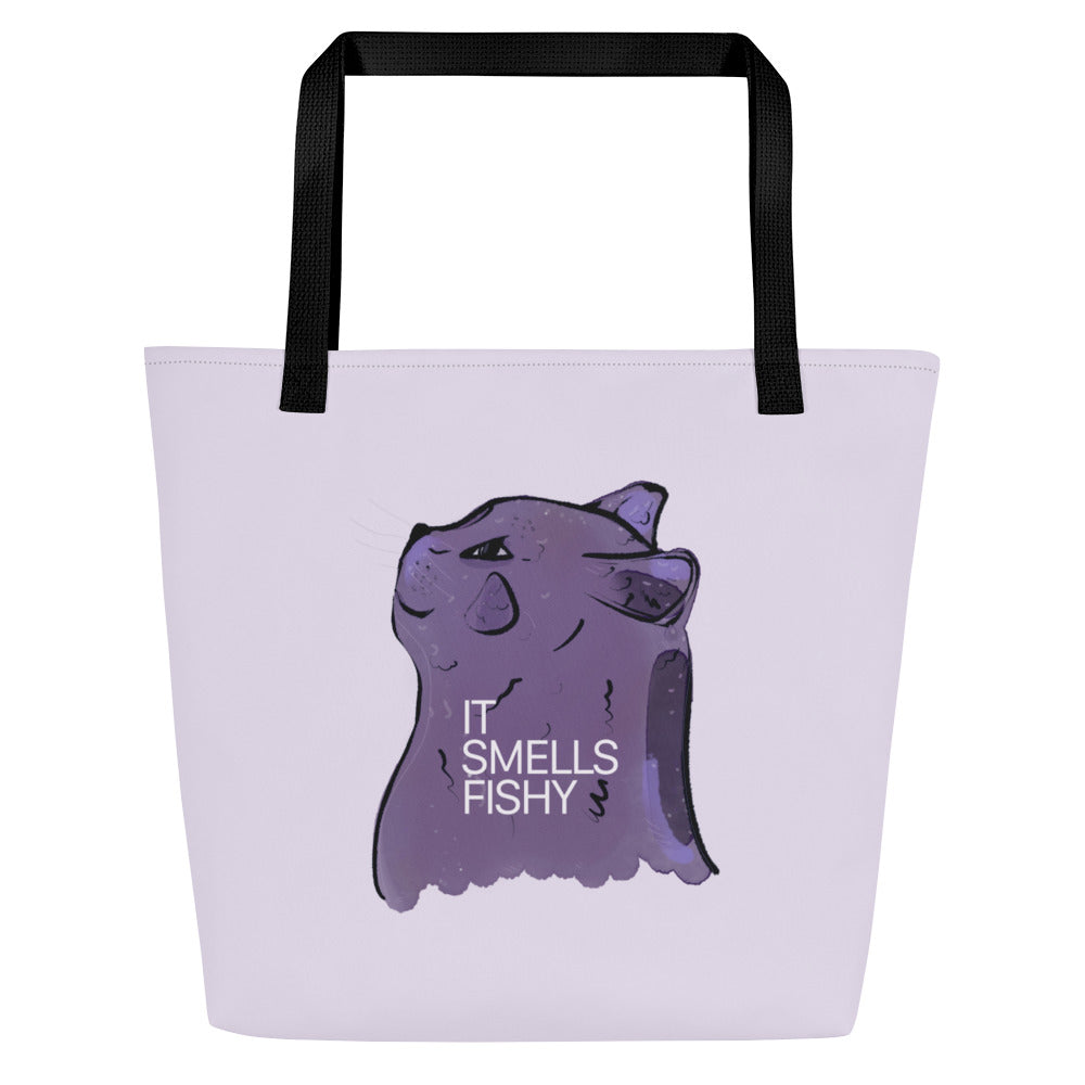 Purple illustrated cat tote bag with the phrase “It smells fishy” – playful, sassy design on light lilac background