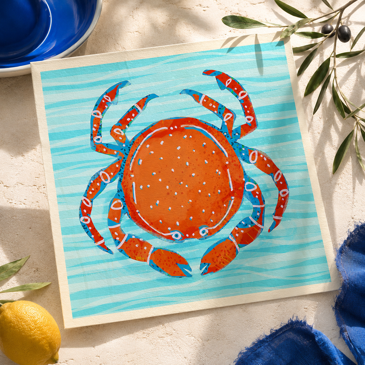 Colorful orange crab art print in a Mediterranean-inspired setting