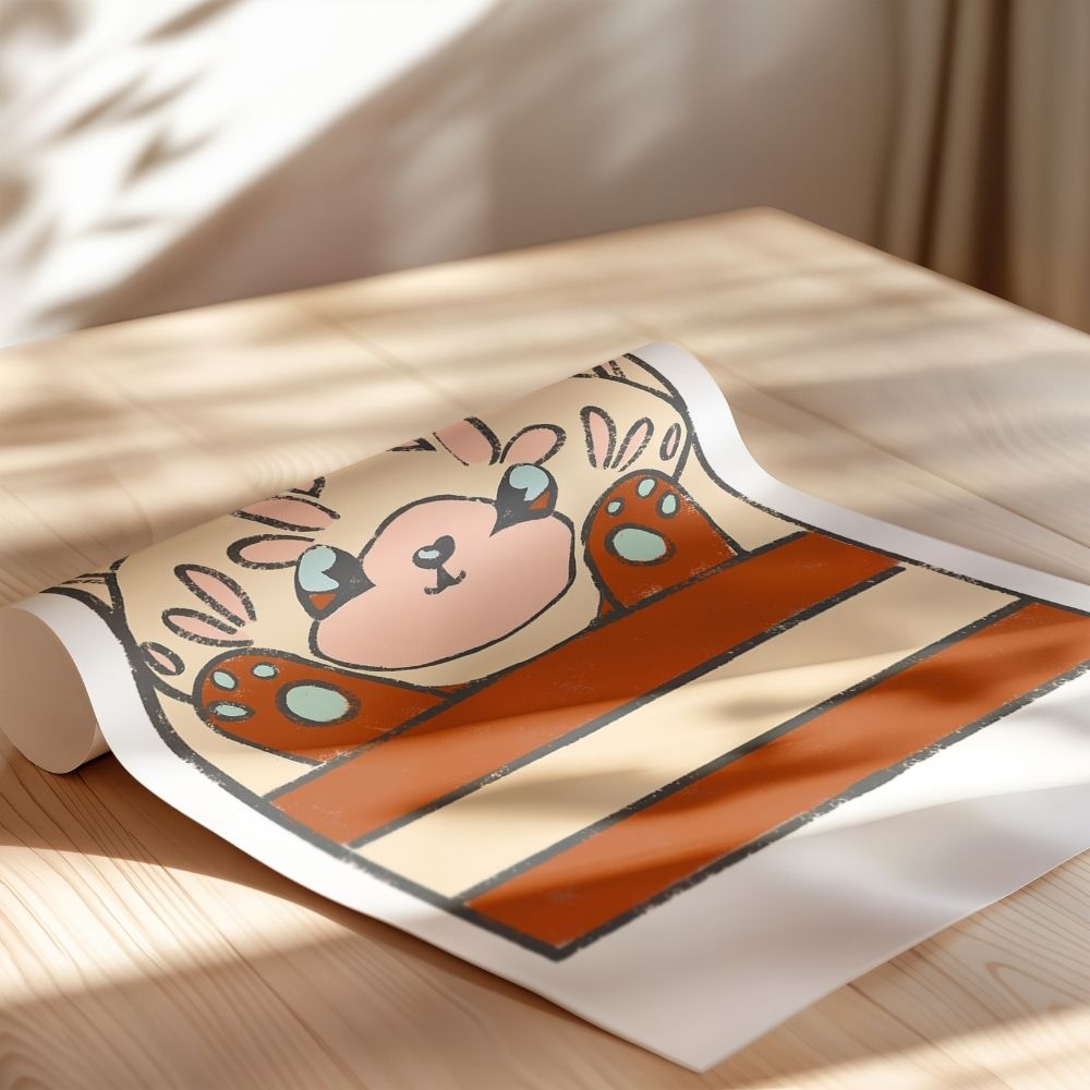 Rolled art print with cute bear paw illustration in warm earthy tones – playful wall decor on sunlit wooden table