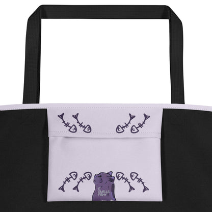 Purple illustrated cat tote bag with the phrase “It smells fishy” – playful, sassy design on light lilac background